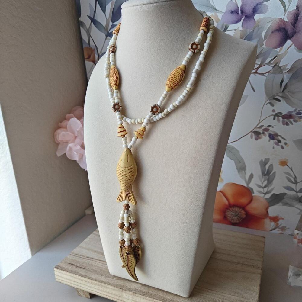 Boho yellow and white beaded acrylic fringe necklace with figural fish pendant